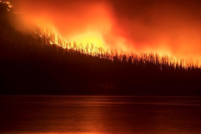 The Latest: Evacuation order lifted near Ennis | iNFOnews.ca