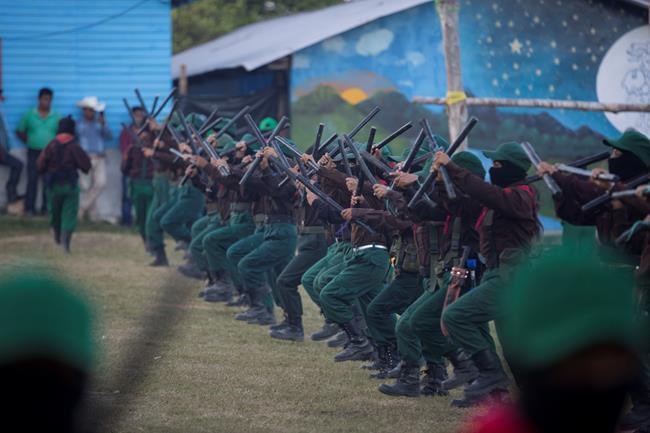 Zapatista rebels vow opposition to Mexico's new president | iNFOnews.ca CP724570877