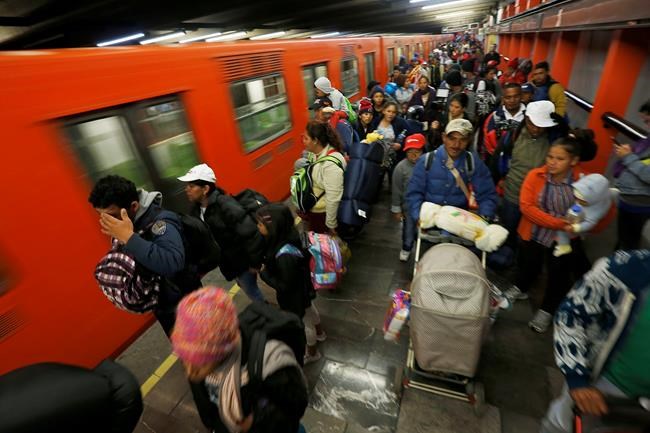 Migrant caravan heads north after departing Mexico City | iNFOnews.ca