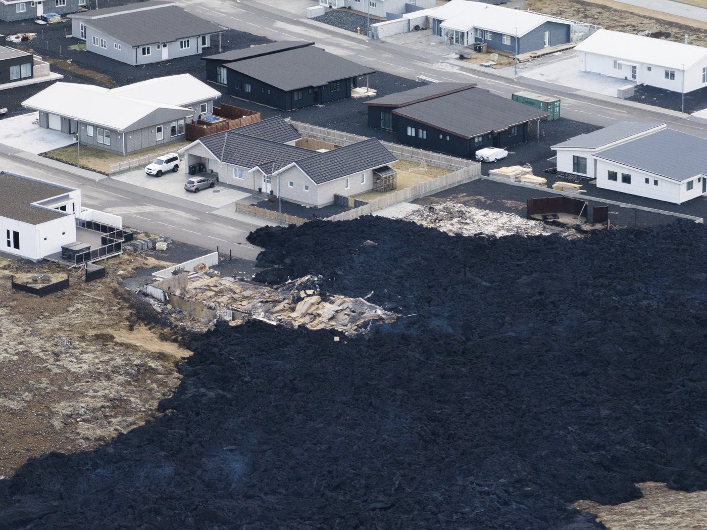 Iceland faces daunting period after lava from volcano destroys homes in fishing town | iNFOnews.ca
