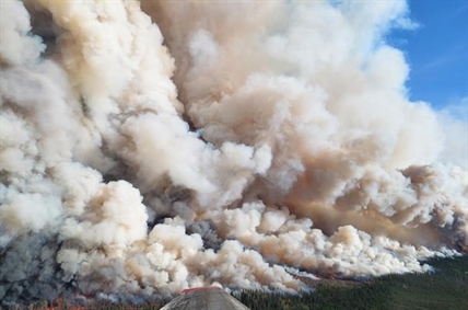 Fire officials worry wind could push wildfire into Fort Nelson today | iNFOnews.ca