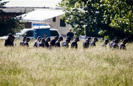Investigators bring in boat in search near Calgary-area acreage in missing family case | iNFOnews.ca