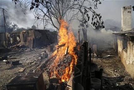 So much for the ceasefire; Ukraine shelling claims lives, sets houses ablaze | iNFOnews.ca So much for the ceasefire; Ukraine shelling claims lives, sets houses ablaze | iNFOnews.ca