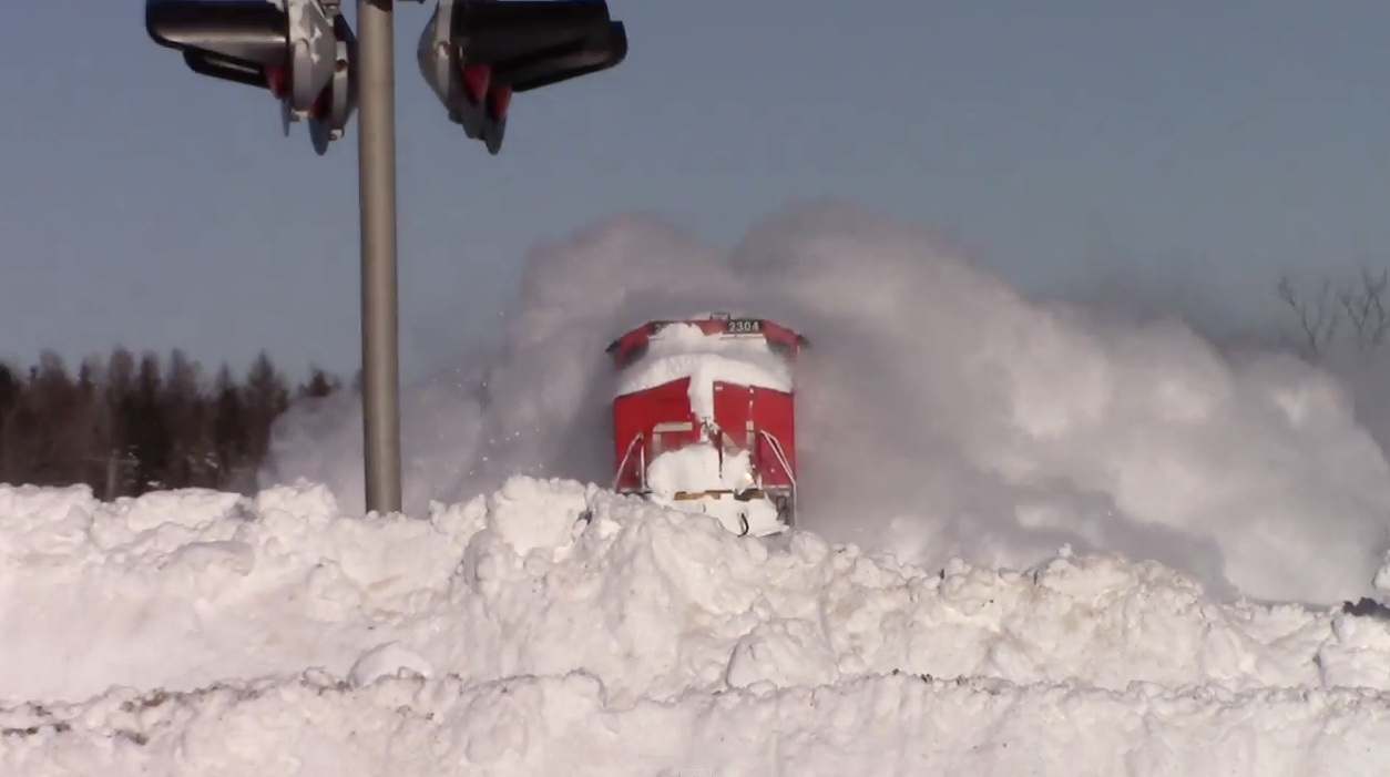 CN train blasts through massive snowbank | iNFOnews.ca