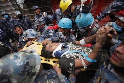 Teenager rescued from rubble in Nepal as aftershocks keep capital's residents on edge | iNFOnews.ca