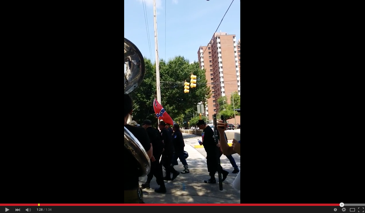 TRENDING NOW: Guy plays tuba at KKK march | iNFOnews.ca