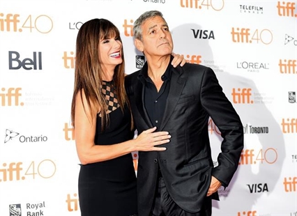 Clooney, at 'Our Brand Is Crisis' premiere, says more roles should be rewritten for women | iNFOnews.ca Clooney, at 'Our Brand Is Crisis' premiere, says more roles should be rewritten for women | iNFOnews.ca
