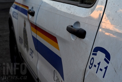 The driver's side door of an RCMP police vehicle.