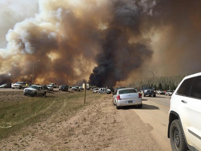 Close brush with flames: staff at Alberta school bring students through wildfire | iNFOnews.ca