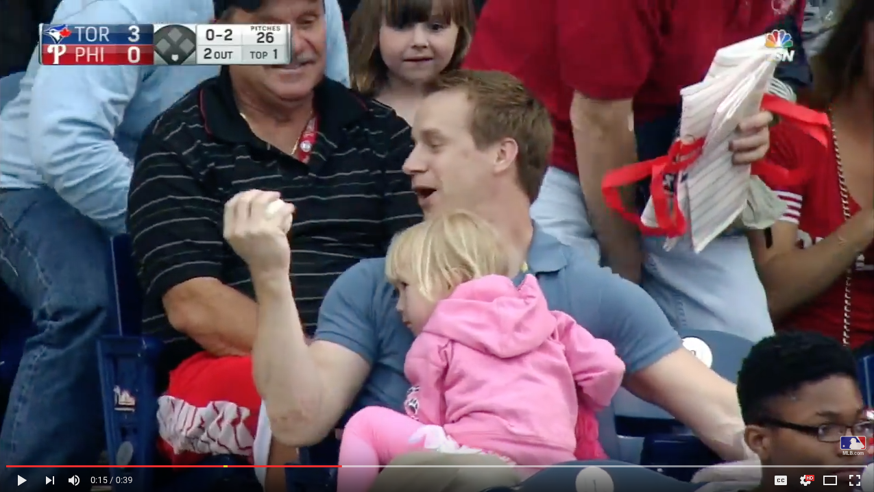 TRENDING NOW: Dad grabs foul ball with tired child in lap | iNFOnews.ca