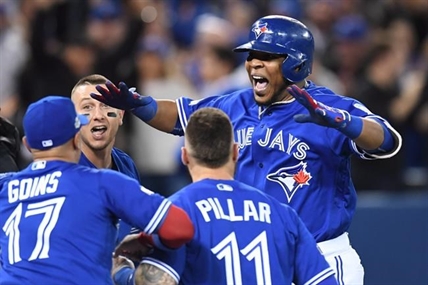 Encarnacion homers as Jays win wild-card game over Orioles in extra-inning thriller | iNFOnews.ca