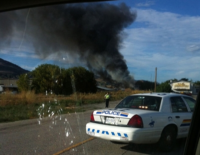 Grass fire sparked near auto wreckers | iNFOnews.ca