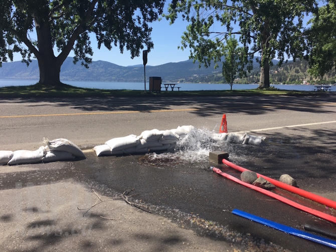 Pumps, hoses and water where it shouldn't be in Peachland | iNFOnews.ca