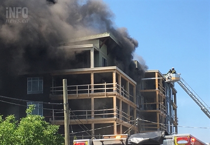 UPDATE: Residents evacuated after Kelowna building goes up in flames, collapses | iNFOnews.ca