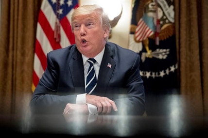 Trump corrects his quote, says misspoke on Russian meddling | iNFOnews.ca