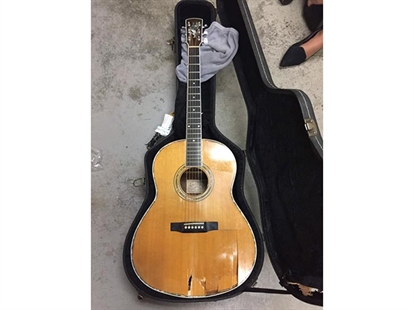 Musician mourns his vintage, handmade guitar stabbed by airport forklift | iNFOnews.ca Musician mourns his vintage, handmade guitar stabbed by airport forklift | iNFOnews.ca