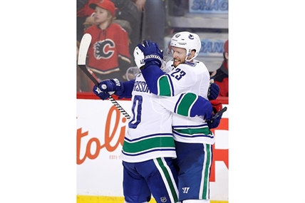 Alex Edler gives Vancouver Canucks big overtime win over Calgary Flames | iNFOnews.ca