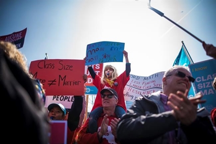 Unions hold rally at Ontario legislature to protest education cuts | iNFOnews.ca