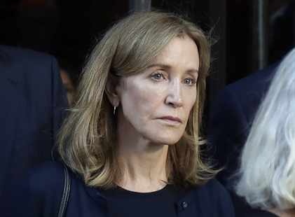 Felicity Huffman starts serving prison time in college scam | iNFOnews.ca