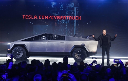 iN PHOTOS: Stainless steel, broken glass and buzz, Tesla makes a pickup | iNFOnews.ca