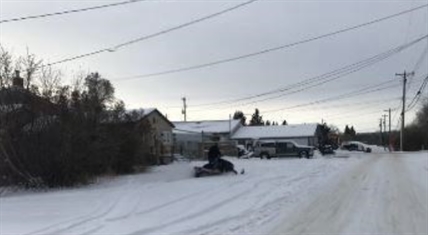 Man arrested in Alberta bank robbery where suspect allegedly fled on snowmobile | iNFOnews.ca