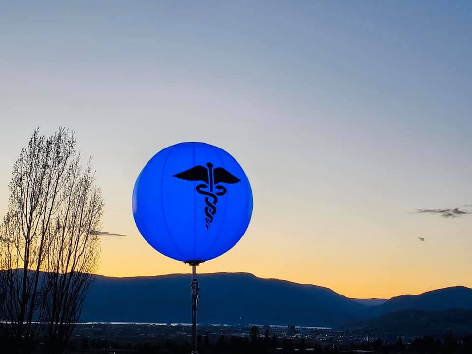 iN PHOTOS: Glowing balloons appear on Kelowna hillside to honour health workers | iNFOnews.ca