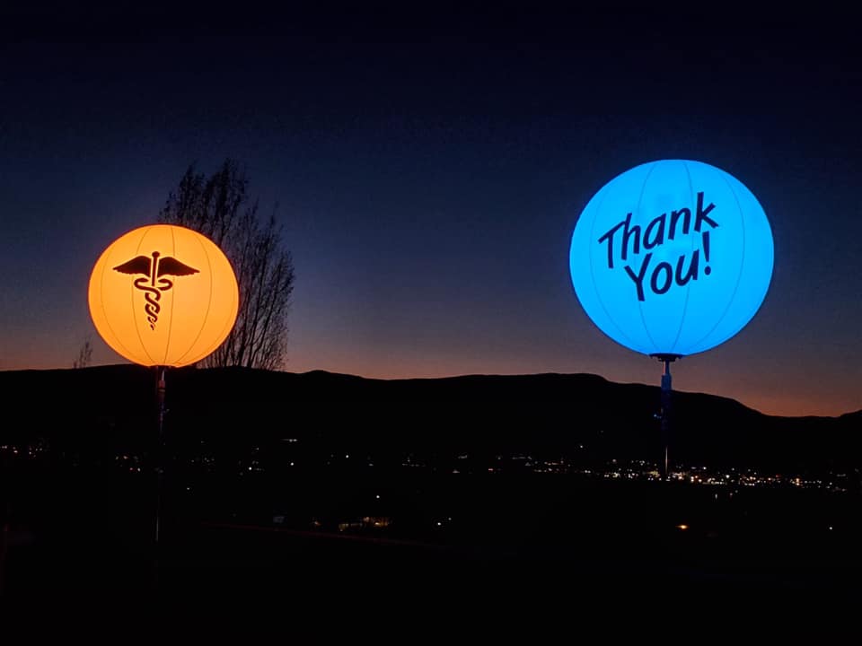 iN PHOTOS: Glowing balloons appear on Kelowna hillside to honour health workers | iNFOnews.ca