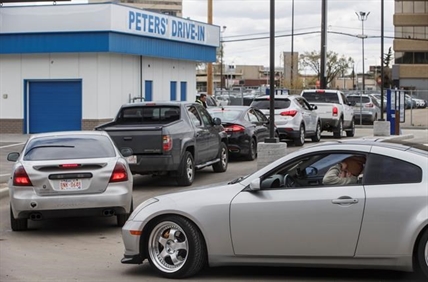Burgers, ice cream, doughnuts and plants: Queues forming for non-essential items | iNFOnews.ca