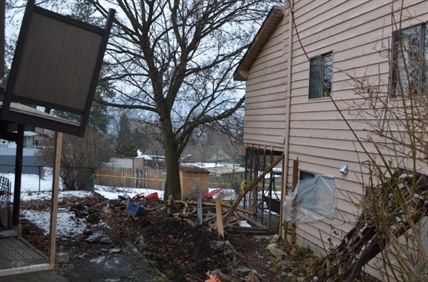 Garbage truck crashes into Vernon yard | iNFOnews.ca