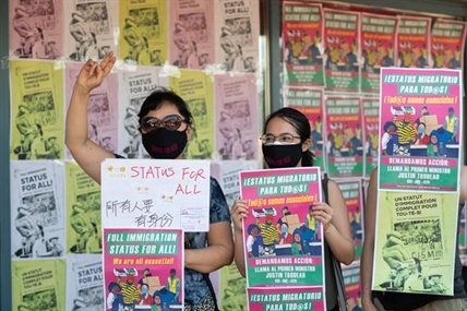 Migrant workers stage multi-city action for full status amid COVID-19 risks | iNFOnews.ca