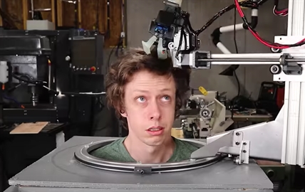 TRENDING NOW: This guy made a robot to cut his hair with scissors | iNFOnews.ca
