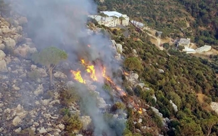 Mideast wildfires kill 3, force thousands to flee homes | iNFOnews.ca