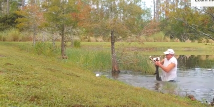TRENDING NOW: Florida man doesn't even drop cigar as he saves puppy from alligator's jaws | iNFOnews.ca