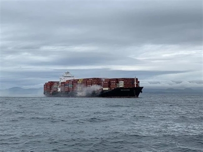 Hazardous materials burned aboard container ship anchored near Victoria | iNFOnews.ca