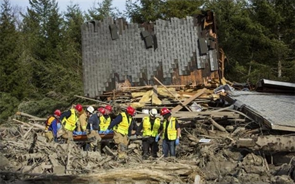 Washington mudslide death toll climbs to 14 as search for scores of missing people continues | iNFOnews.ca