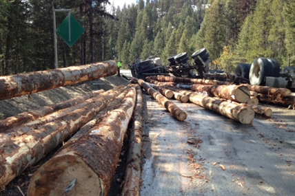 Logging truck overturns on Highway 33 | iNFOnews.ca