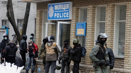 Uniformed men occupy police headquarters in eastern Ukraine | iNFOnews.ca