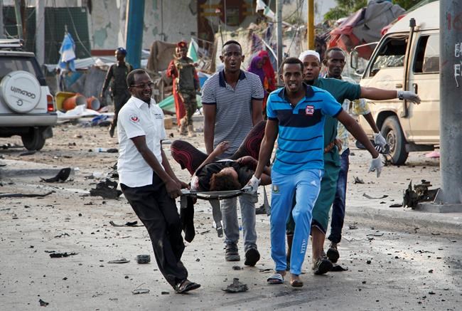 4 car bombs explode by hotel in Somalia's capital; 20 dead | iNFOnews.ca 4 car bombs explode by hotel in Somalia's capital; 20 dead | iNFOnews.ca