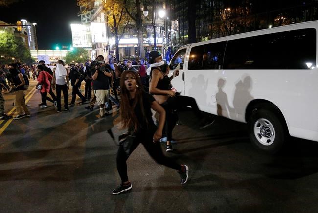 The Latest: Protesters trying to stop cars on interstate | iNFOnews.ca CP2049309246