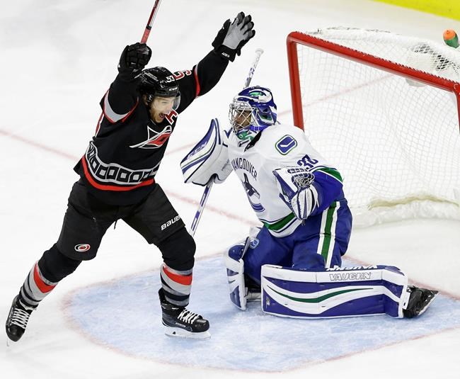 Hurricanes earn wild 8-6 victory over Canucks | iNFOnews.ca Hurricanes earn wild 8-6 victory over Canucks | iNFOnews.ca