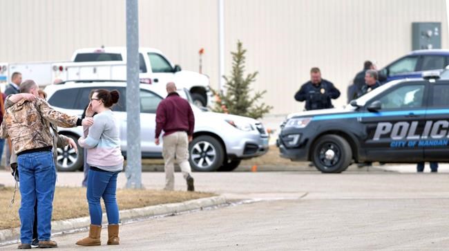 The Latest: Field searched near company where 4 found slain | iNFOnews.ca CP579495036