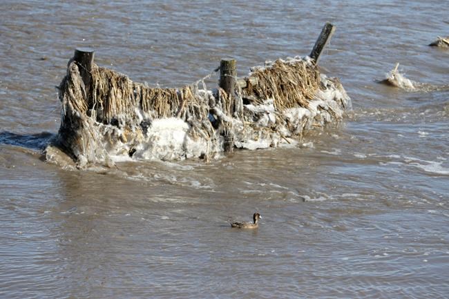 Midwest flooding forces evacuations, closing of road, river | iNFOnews.ca Midwest flooding forces evacuations, closing of road, river | iNFOnews.ca
