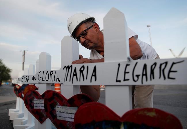 Man who made 27,000 crosses for shooting victims is retiring | iNFOnews.ca