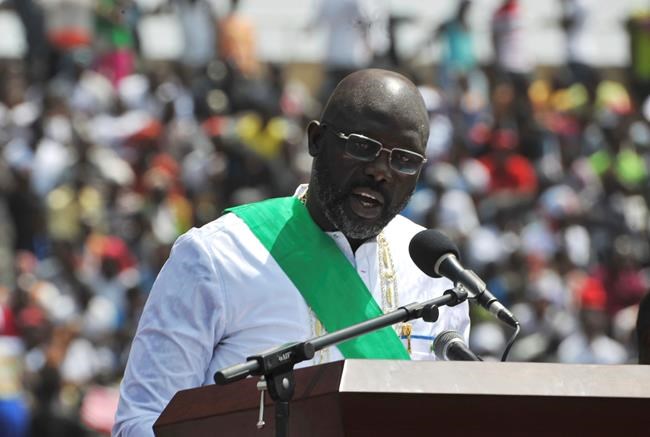 Liberia's footballer president Weah marks year in office | iNFOnews.ca CP1877520083