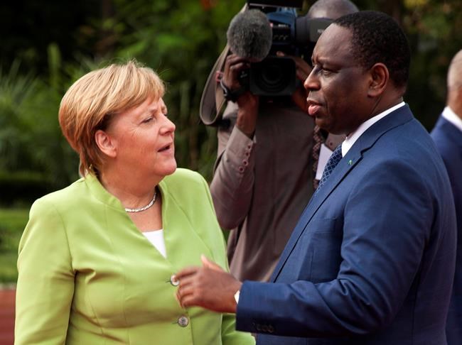 Merkel arrives for West Africa visit on business, migrants | iNFOnews.ca Merkel arrives for West Africa visit on business, migrants | iNFOnews.ca