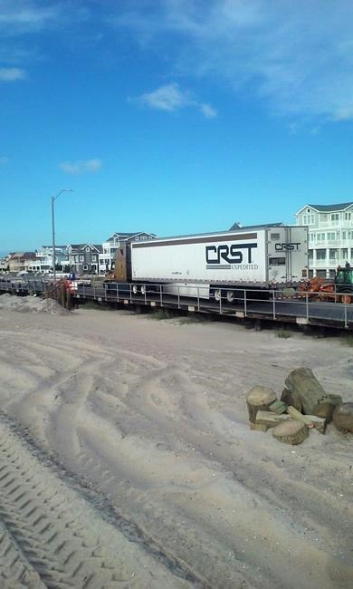 Tractor-trailer makes wrong turn, gets stuck on boardwalk | iNFOnews.ca