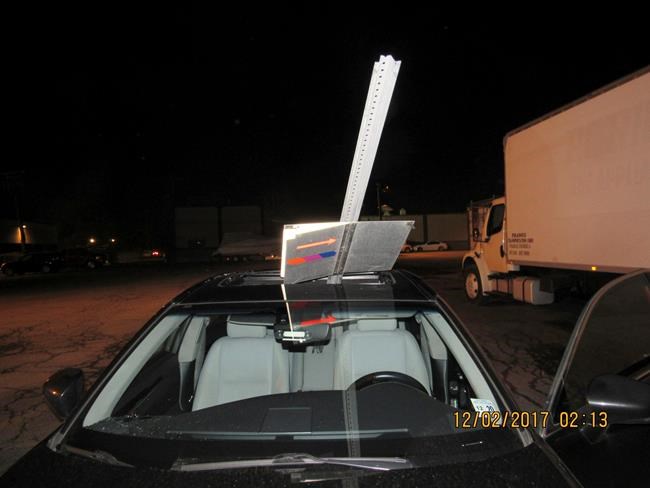 Police: Woman drove with transit sign sticking out of car | iNFOnews.ca