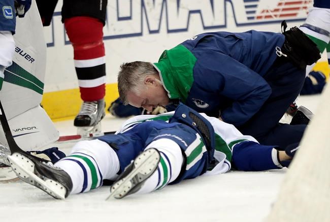 Canucks defenceman Larsen taken off ice on stretcher | iNFOnews.ca Canucks defenceman Larsen taken off ice on stretcher | iNFOnews.ca