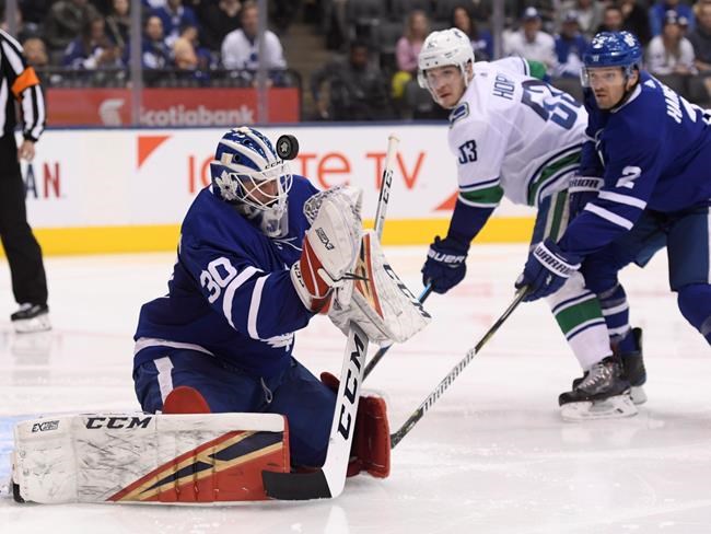 Hutchinson makes 28 saves, Moore scores first NHL goal as Leafs blank Canucks | iNFOnews.ca