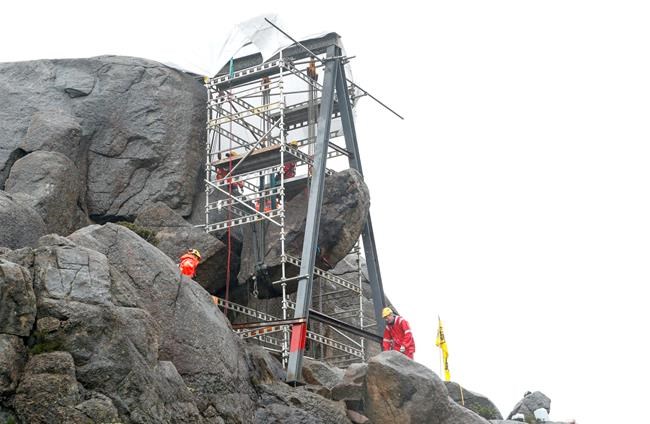 Workers put penis-shaped rock formation back up in Norway | iNFOnews.ca CP1985766921